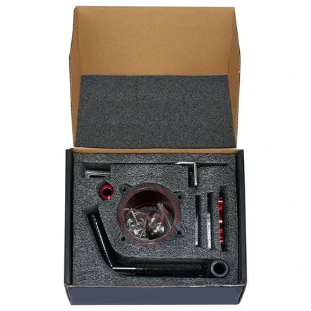 Red 6.7 Cummins EGR cooler and throttle valve delete kit protected in foam packaging
